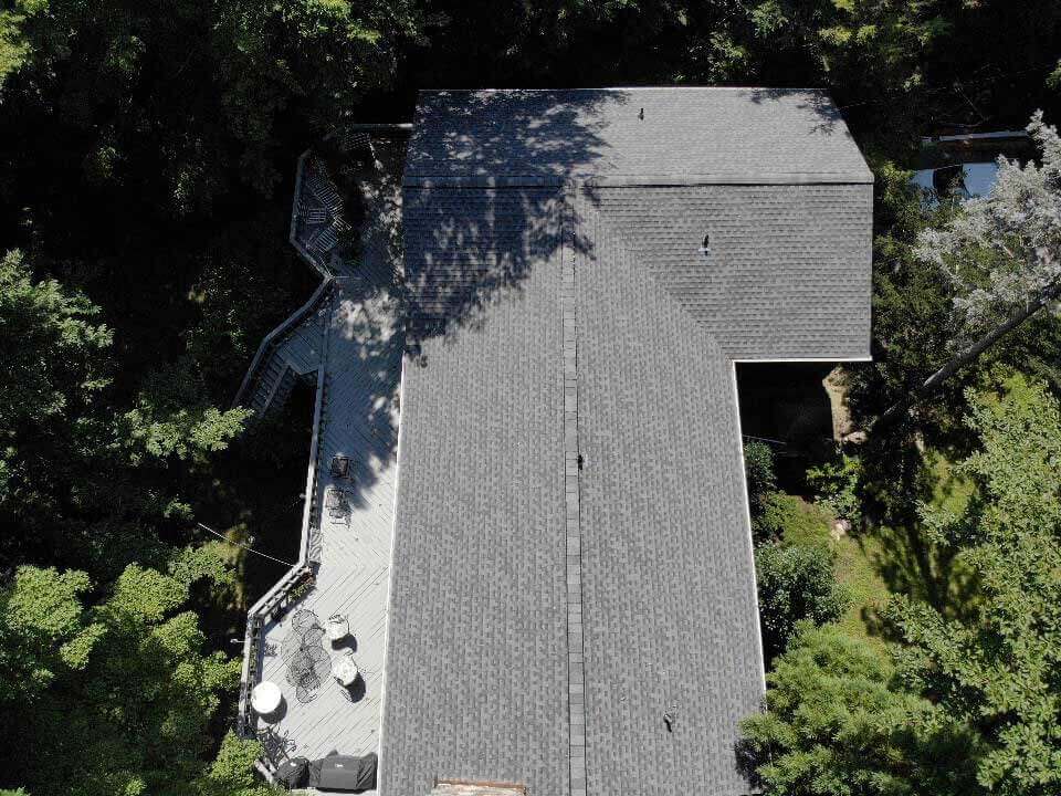 Overhead view of gray GAF asphalt shingle replacement on home in Putnam Valley