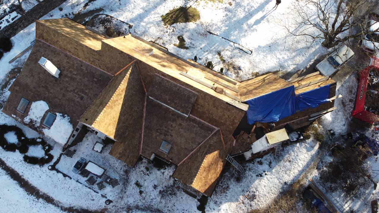 Aerial view of roof on a snowy day