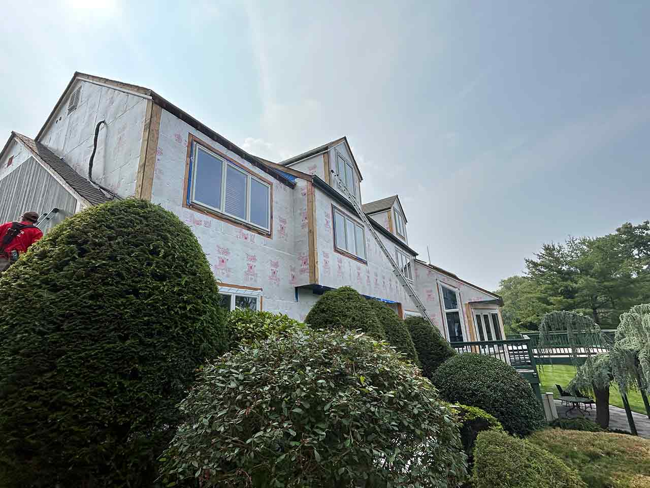 Polar wrap insulation being applied to home